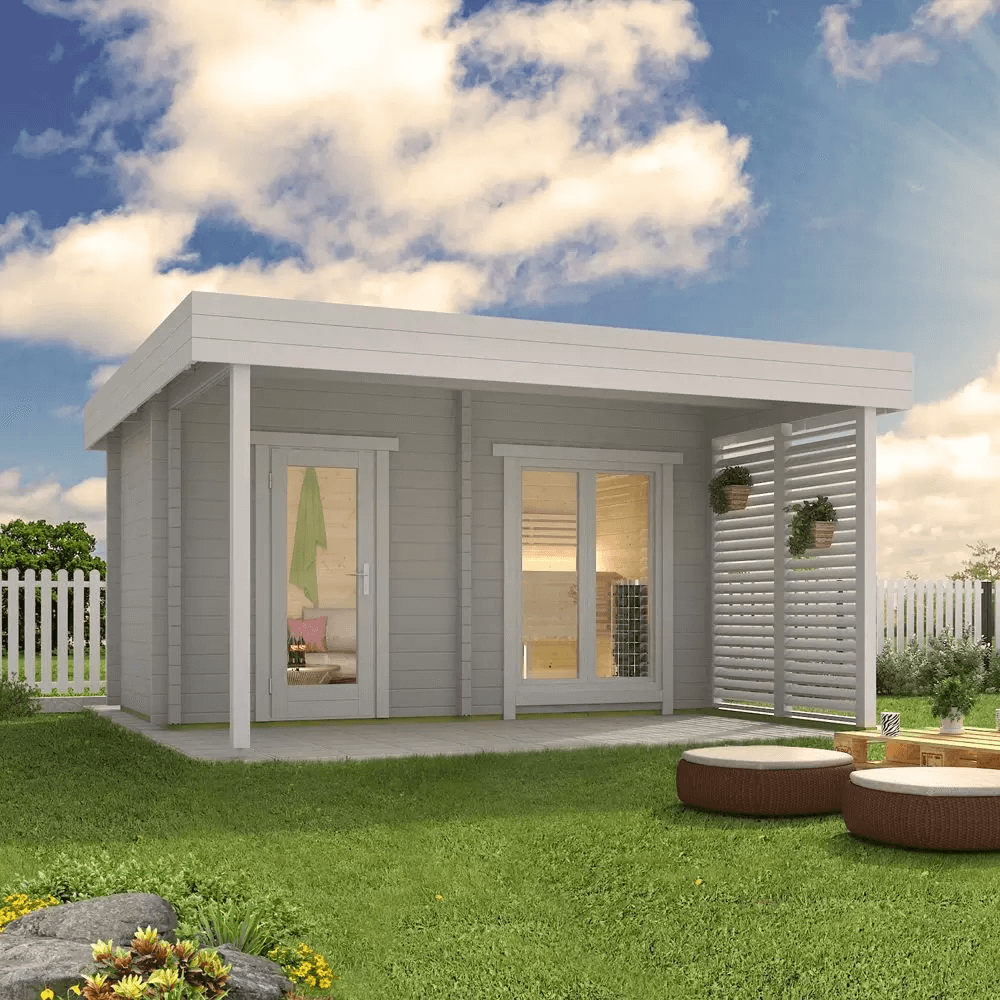 InMedias Magnus Log Sauna in white finish placed in a garden setting.