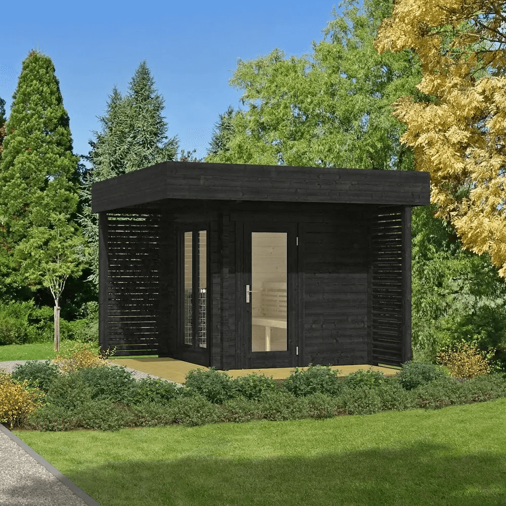 InMedias Mattias Log Sauna in black finish on a garden background.