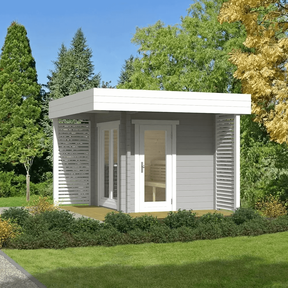 InMedias Mattias Log Sauna in white and grey finish on a garden background.