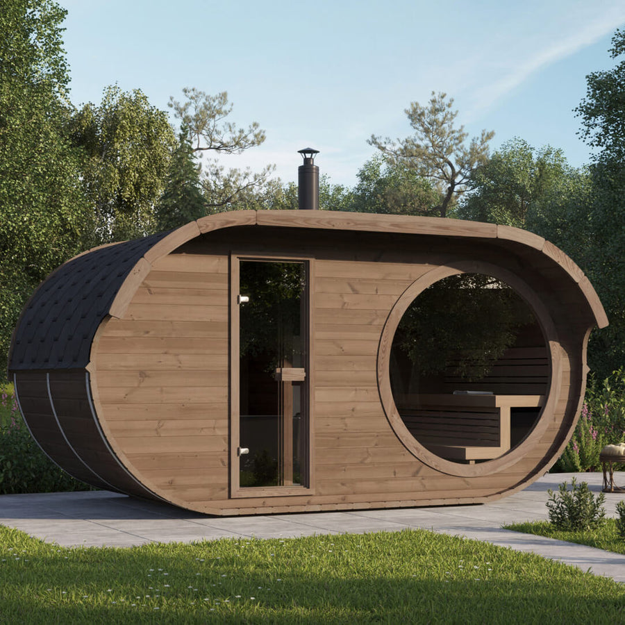 InMedias Raiki Oval Sauna exterior view in a garden with trees in the background.
