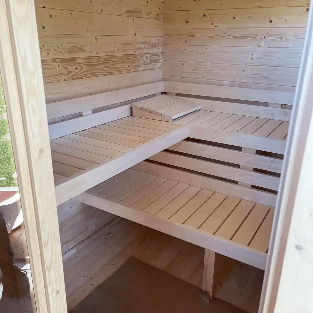 Interior benches of the InMedias Timo Log Sauna.
