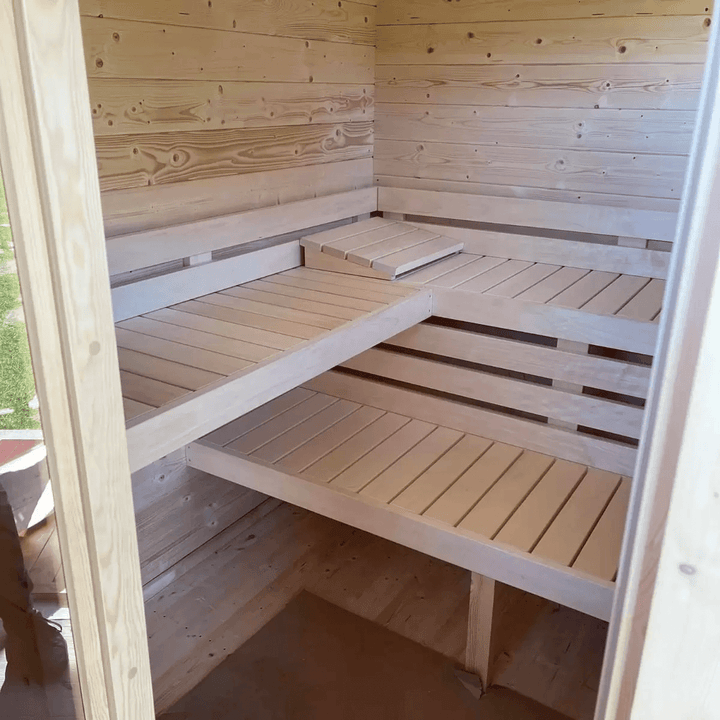 Interior benches of the InMedias Timo Log Sauna.