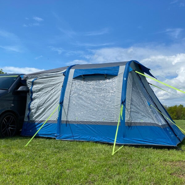 Loopo Breeze Inflatable Campervan Awning in blue in a field