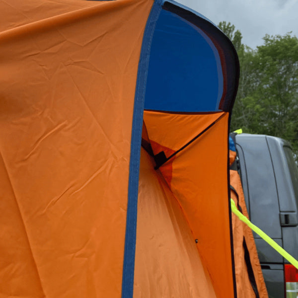 Loopo Breeze Inflatable Campervan Awning in orange shown from a corner