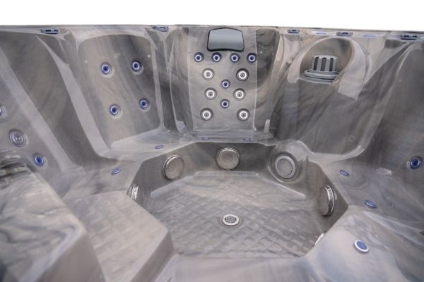 Luso Spas The Platinum 10 Hot Tub interior view showing massage jets and filter.