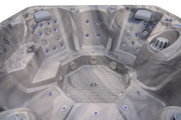 Luso Spas The Platinum 10 Hot Tub angled interior view with multiple seating and jets.