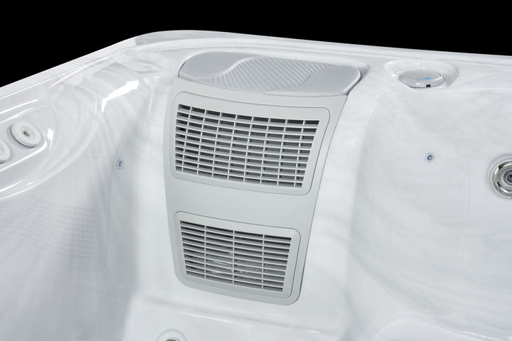 Luso Spas The Hydra Hot Tub interior view highlighting the central filtration and vent system.