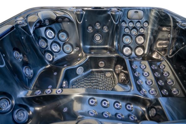 Luso Spas The Hercules Hot Tub black interior showing massage jets and seating configuration.