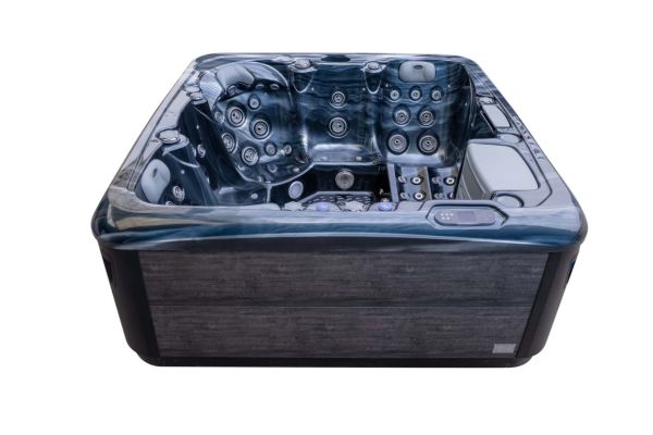 Front view of Luso Spas The Platinum 4 Hot Tub empty with visible jets and seating, on a white background.