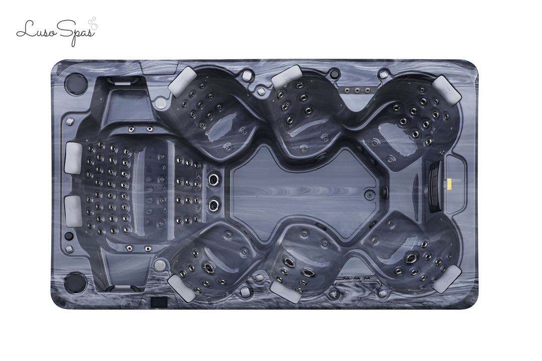 Top-down view of the Luso Spas The Party Pool Hot Tub in dark marble finish on a white background, showing multiple jet placements and headrests.