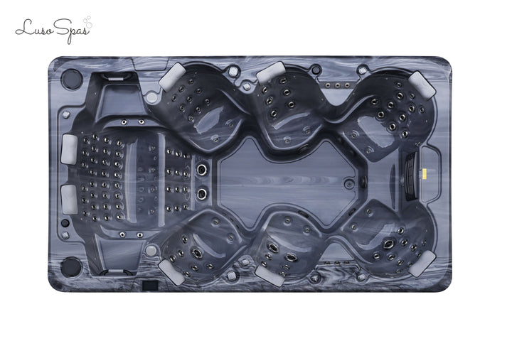 Top-down view of the Luso Spas The Party Pool Hot Tub in dark marble finish on a white background, showing multiple jet placements and headrests.