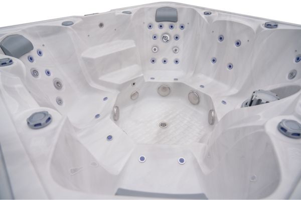 Luso Spas The Platinum 10 Hot Tub interior view with white finish and multiple jets on a white background.