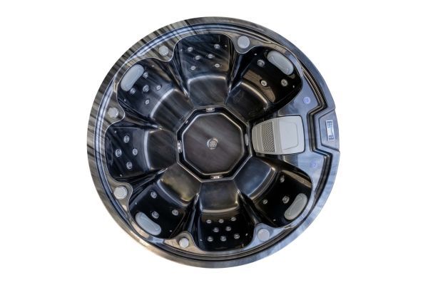 Overhead view of Luso Spas The Orb Hot Tub in dark marble finish showcasing circular design and jet placement for six users, on a white background.