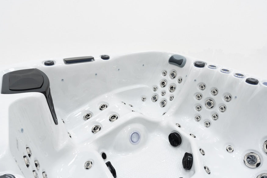 Luso Spas The Garda Hot Tub interior showing multiple hydrotherapy jets and ergonomic seats on a white background.
