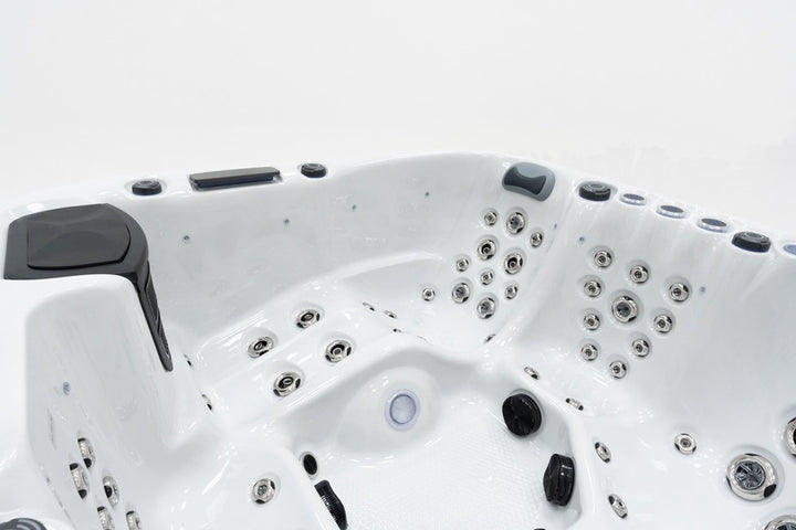 Luso Spas The Garda Hot Tub interior showing multiple hydrotherapy jets and ergonomic seats on a white background.