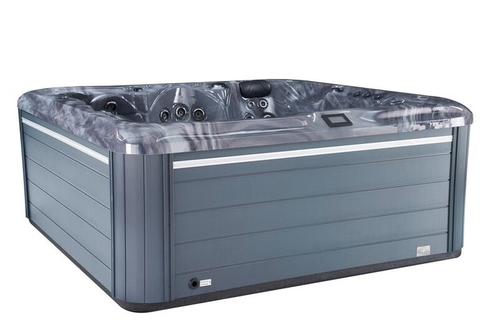 uso Spas The Hercules Hot Tub exterior angled view with grey shell and cabinet panels, on a white background.