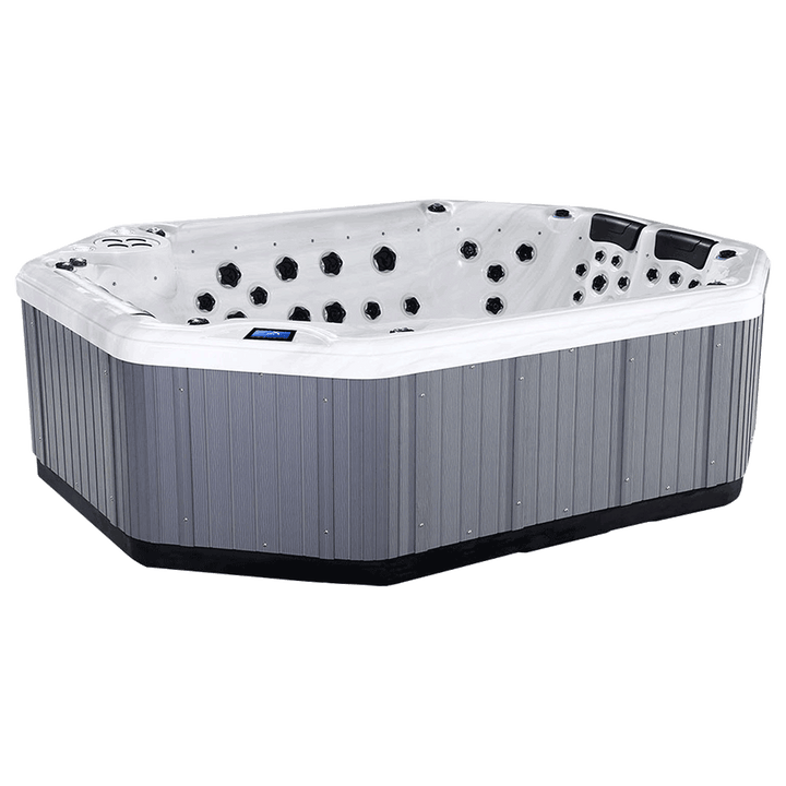 Side perspective of the Luso Spas The Party Pool 2 hot tub with white interior and grey exterior paneling on a transparent background.