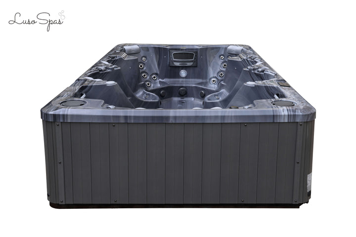 Side angled view of the Luso Spas The Party Pool Hot Tub on a transparent background, highlighting grey exterior panels and white interior.