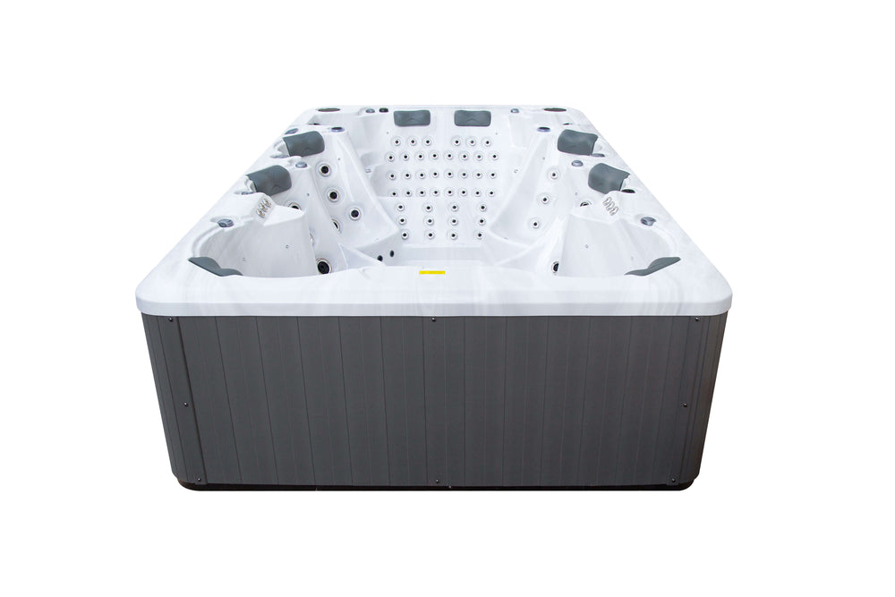 Angled rear view of the Luso Spas The Party Pool Hot Tub in grey marble finish on a white background.