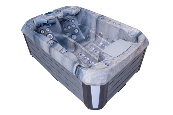 Angled view of Luso Spas The Platinum 1 Hot Tub in grey marble finish featuring multiple hydrotherapy jets and ergonomic design for two users, on a white background.