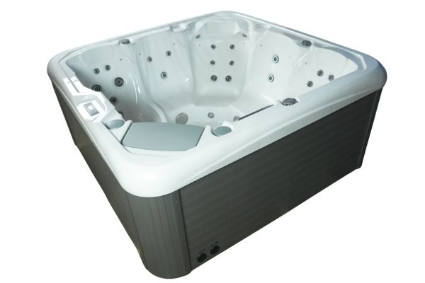 Corner angle of Luso Spas The Platinum 2 Hot Tub in white acrylic with grey panel exterior on a white background.