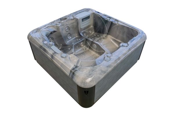 Rear angled view of Luso Spas The Platinum 5 Hot Tub showing jet layout and paneling, on a white background.