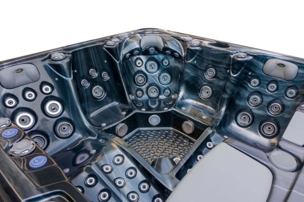 Interior view of Luso Spas The Platinum 4 Hot Tub in dark marble acrylic finish, on a white background.