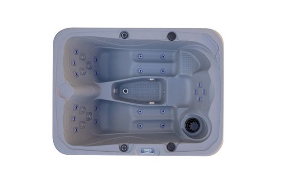 Top-down view of Luso Spas The Rota Triad Hot Tub in light grey featuring built-in cup holder and hydrotherapy jet system on a white background.
