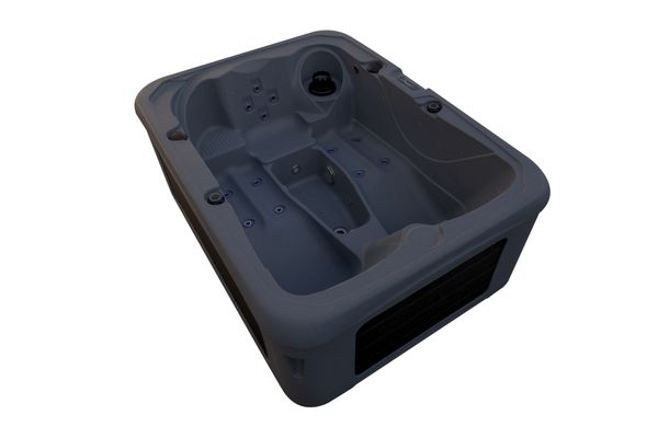 Angled view of Luso Spas The Rota Triad Hot Tub in dark grey with twin recliner seats and jet arrangement on a white background.