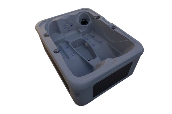 Angled view of Luso Spas The Rota Triad Hot Tub in light grey with contoured seating and jet placement on a white  background.