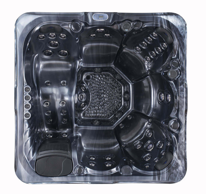 Side angle of Luso Spas The Vela Hot Tub in white acrylic with grey panelling showing compact luxury design for home use on a white background.
