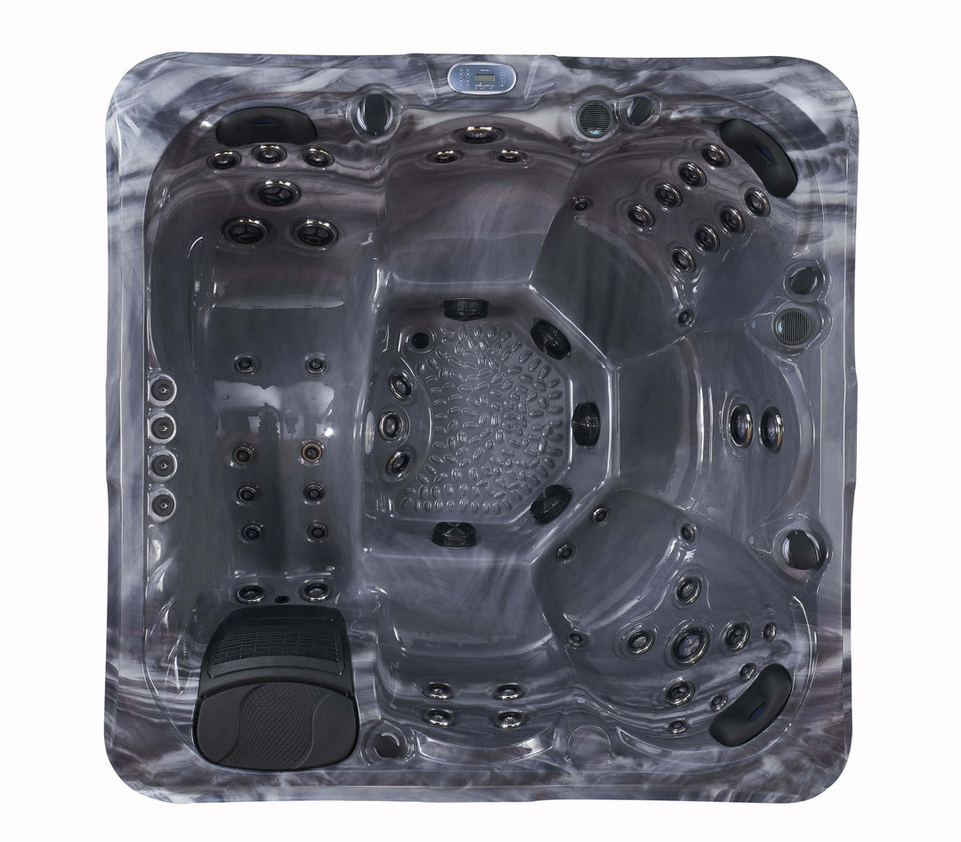 Overhead view of Luso Spas The Vela Hot Tub in black marble finish displaying hydrotherapy seats, massage jets, and LED controls on a white background.