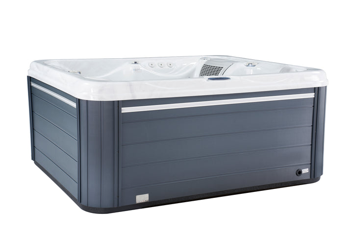 Angled side view of Luso Spas The Vepo Hot Tub in white finish with grey panel exterior and smooth corner edges on a white background.
