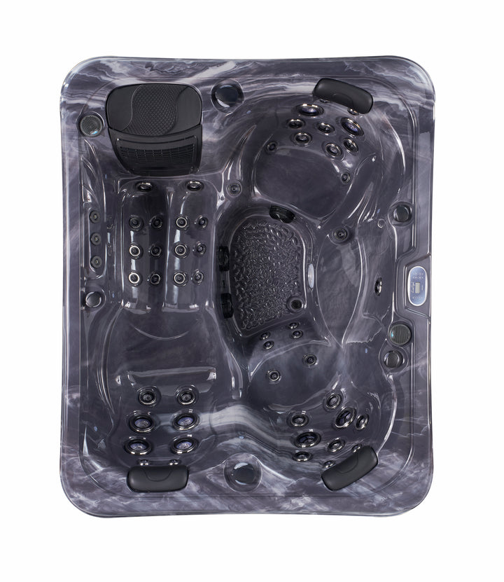 Top-down view of Luso Spas The Vepo Hot Tub in dark marble finish with hydrotherapy jets and built-in headrests on a white background.