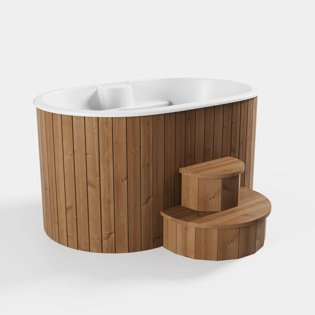 InMedias Ofuro Cold Tub with white interior, oval shape, and natural wood panel exterior on a white background.