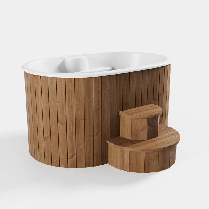 InMedias Ofuro Cold Tub with white interior, oval shape, and natural wood panel exterior on a white background.