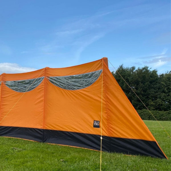 Olpro Inflatable Orange Windbreak in a field