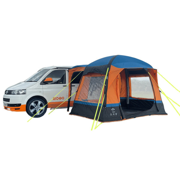 Olpro Uno Breeze in orange next to a motorhome