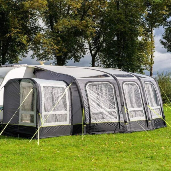 Olpro View 420 Caravan Awning with an extension in a field