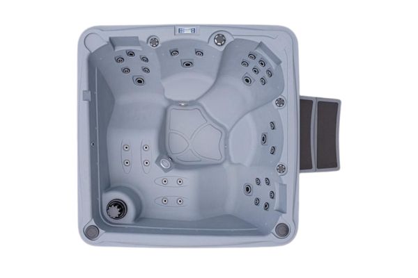 Overhead view of Luso Spas The Rota Laguna Hot Tub in light grey with built-in step section and multiple massage jets on a whitet background.