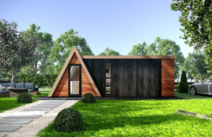 Front view of a modern A-frame and rectangular hybrid glamping pod with a black wood extension and landscaped stone path.