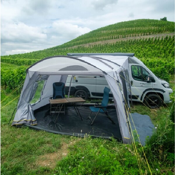 Santa Clara Driveaway Awning in a field next to a hill