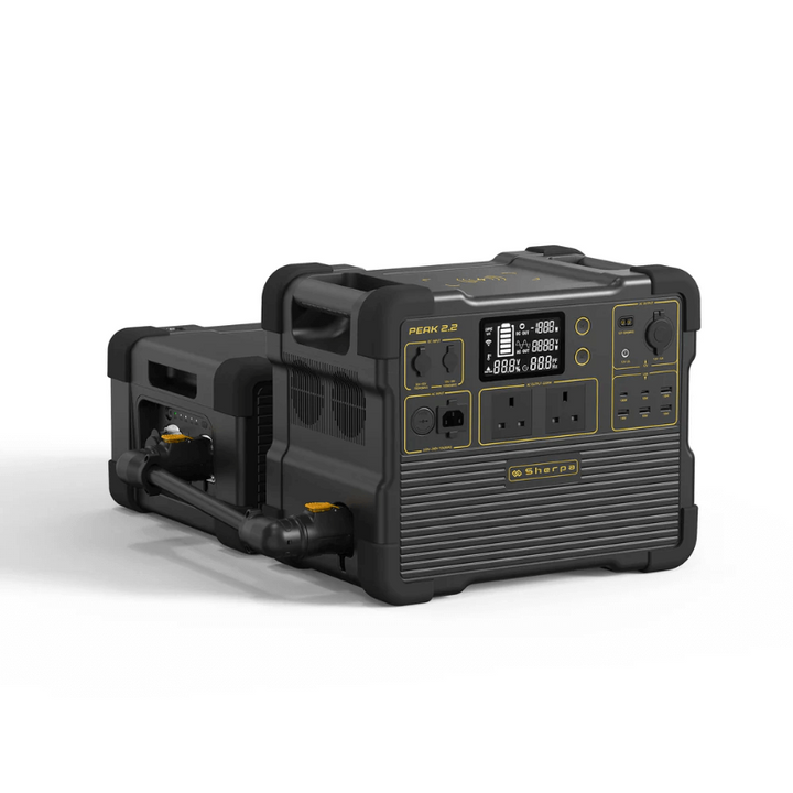 Sherpa Peak 2.2 connected to an extra battery unit via heavy-duty cable, showcasing expandable capacity, on a white background.