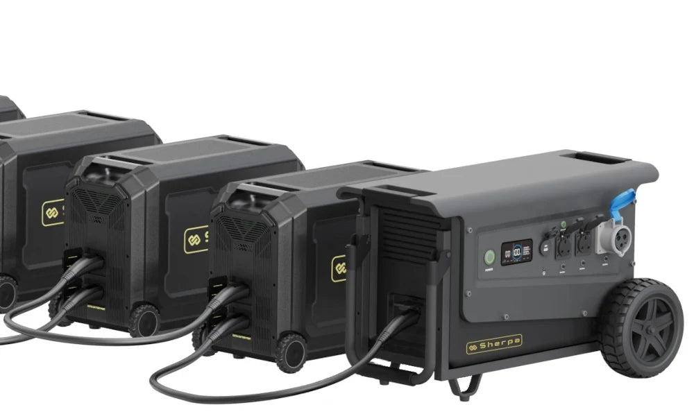 Four Sherpa Pro 5.0 portable power stations connected in series, positioned diagonally, on a white background.