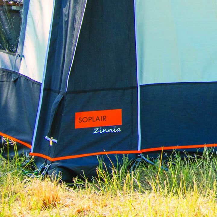 A Soplair Zinnia Air inflatable caravan awning with a close up of the logo