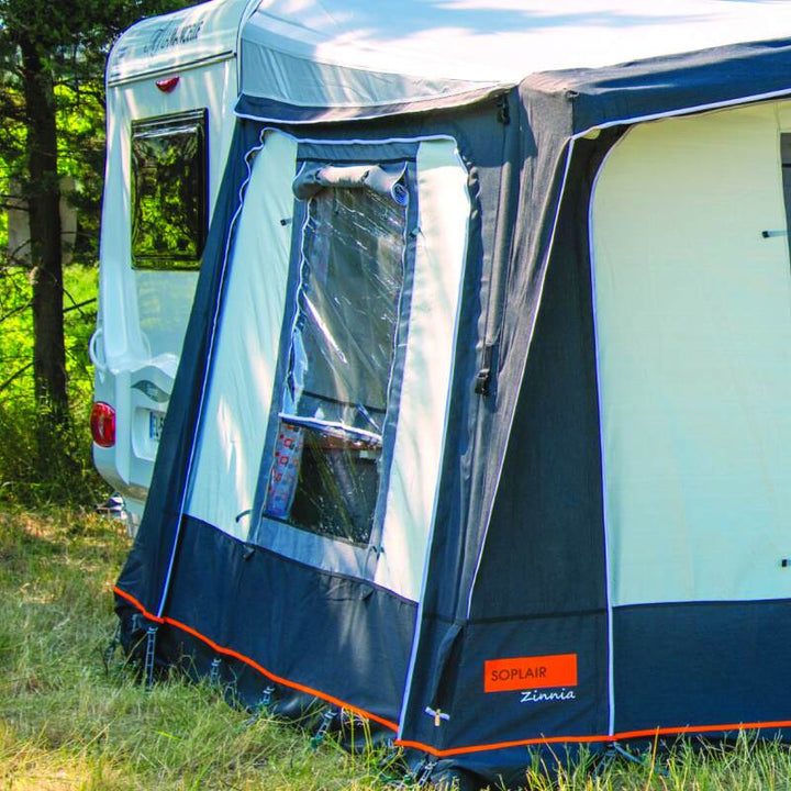 The side window of a Soplair Zinnia Air traditional caravan awning