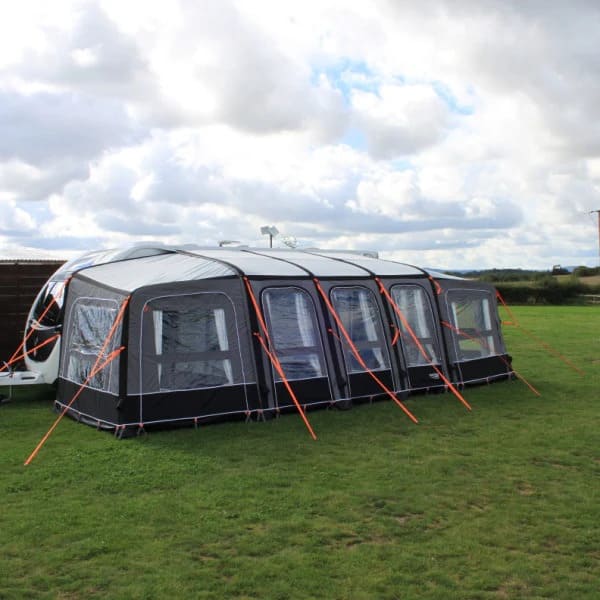 Camptech Starline Elite Infinity Pod in grey and black viewed from the side on a grassy background.