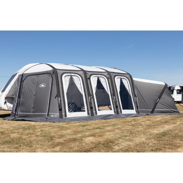 Complete setup of Esteemed Air Awning displaying all panels and side annexe on dry grass