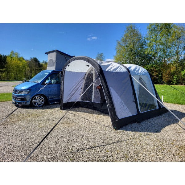 Angled perspective of the Sunncamp Swift Motor Air Driveaway Awning displaying its aerodynamic design and connection to the vehicle