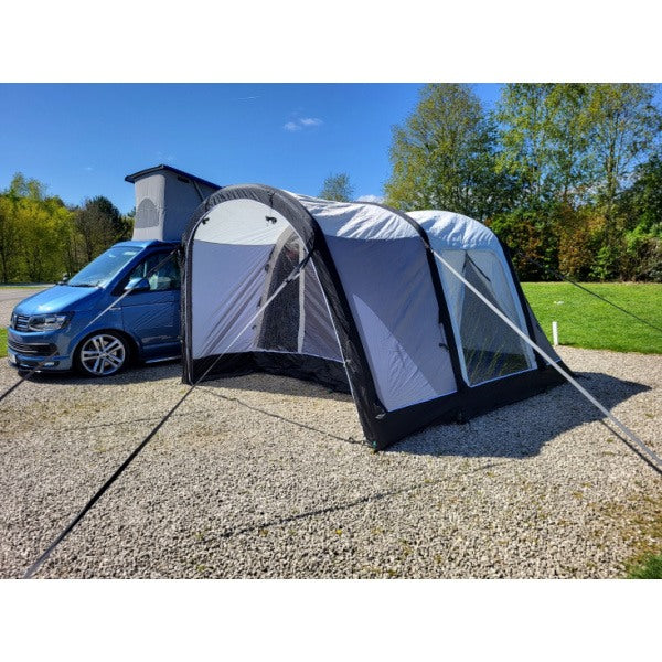 Complete setup of a Sunncamp Swift Motor Air attached to a VW van showing the full length and height of the awning structure